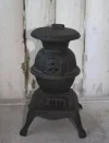 0cc982b3f1a031673369164a37a26898--potbelly-stove-antique-stove.webp